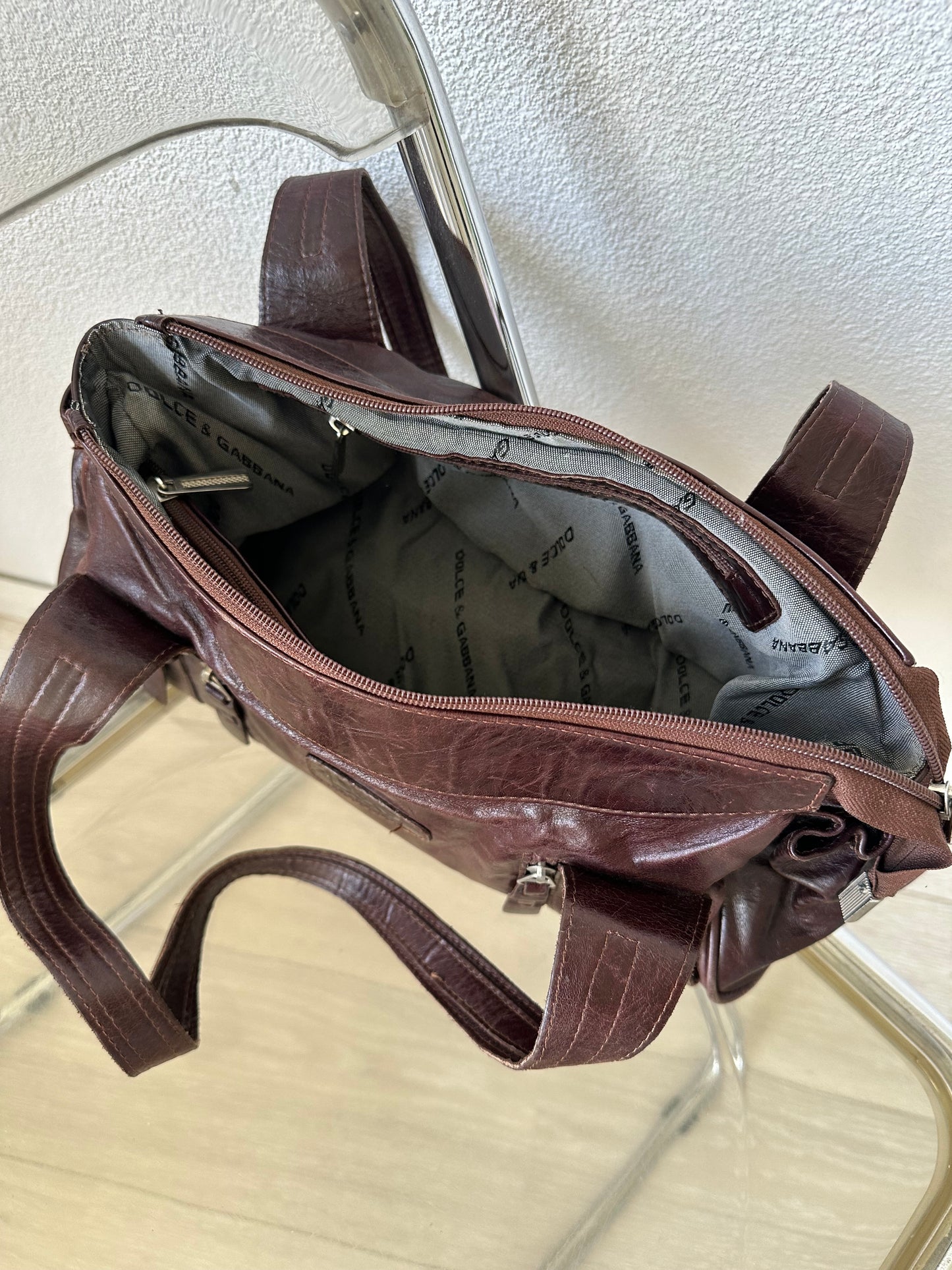 brown leather shoulder bag with silver hardware