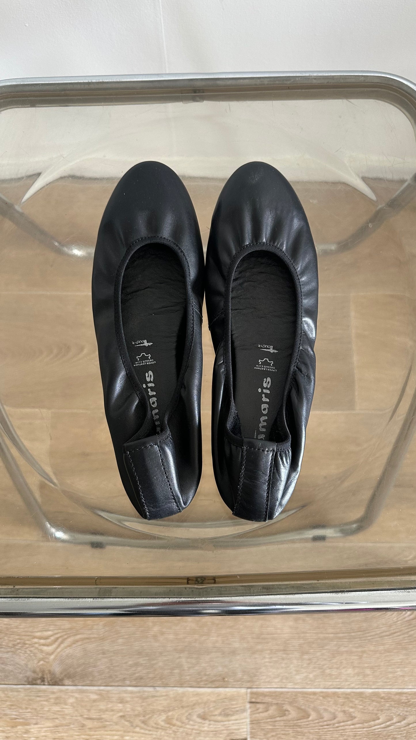 black leather ballet flats