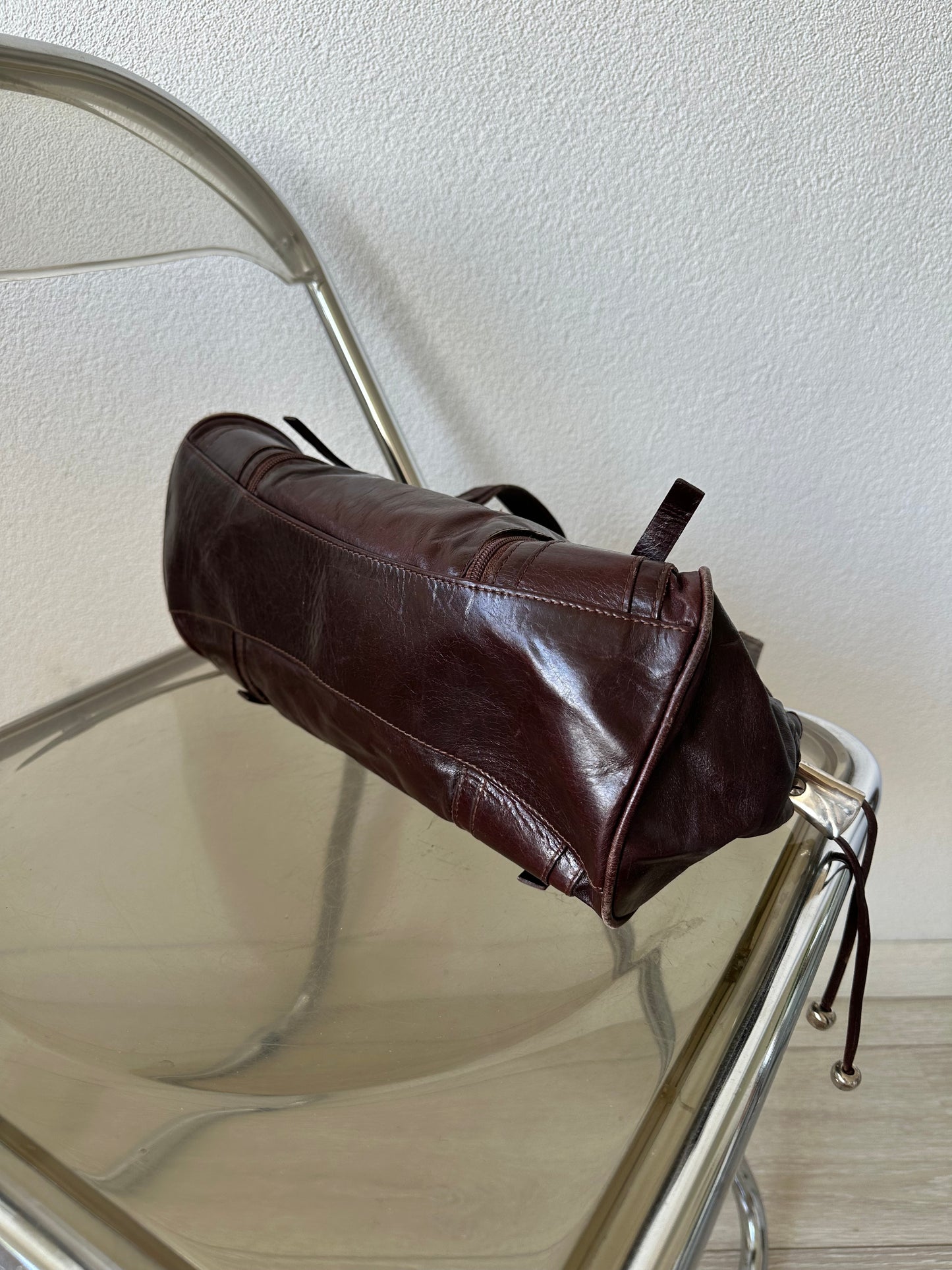 brown leather shoulder bag with silver hardware