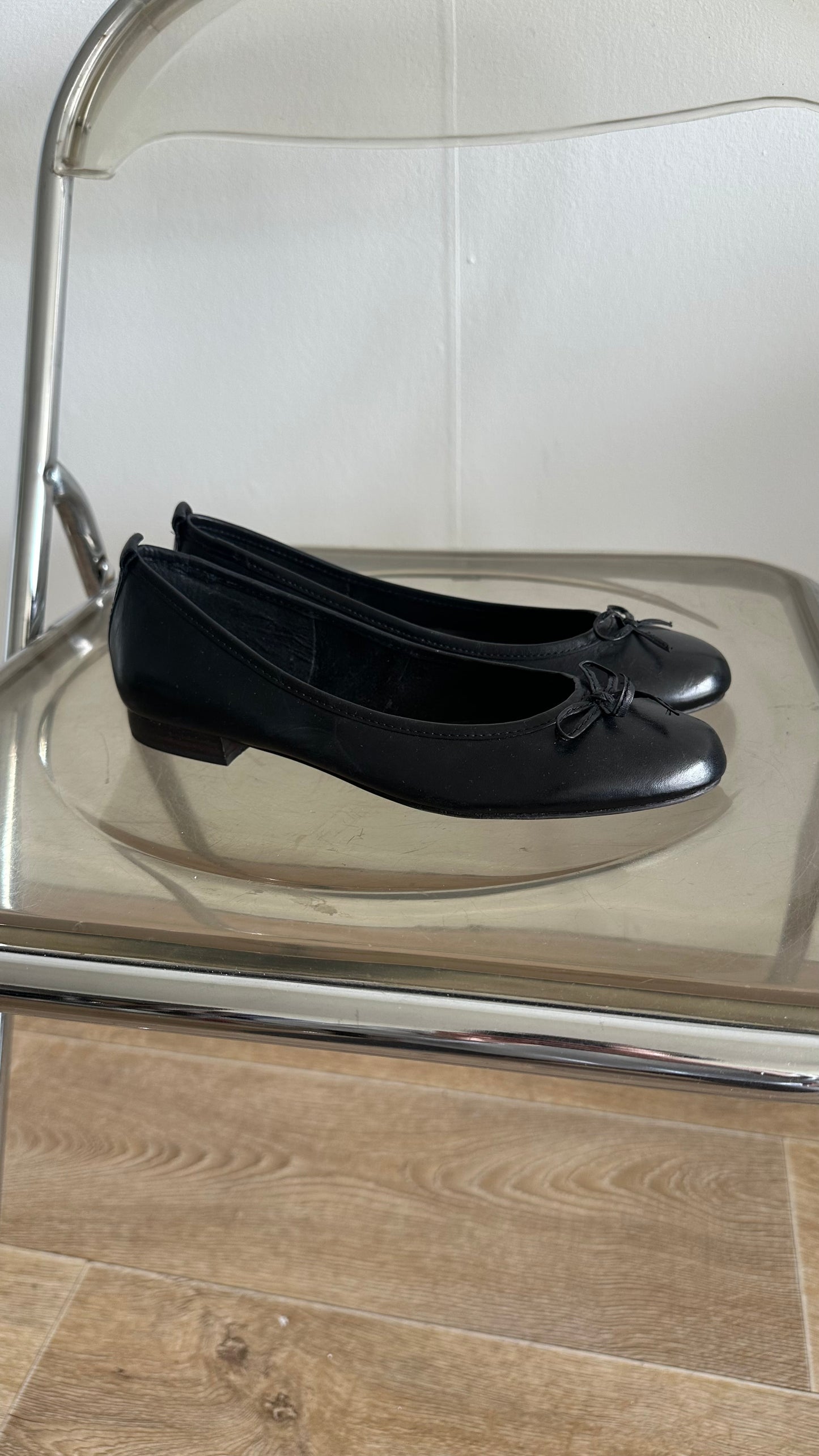 black ballet flats in leather
