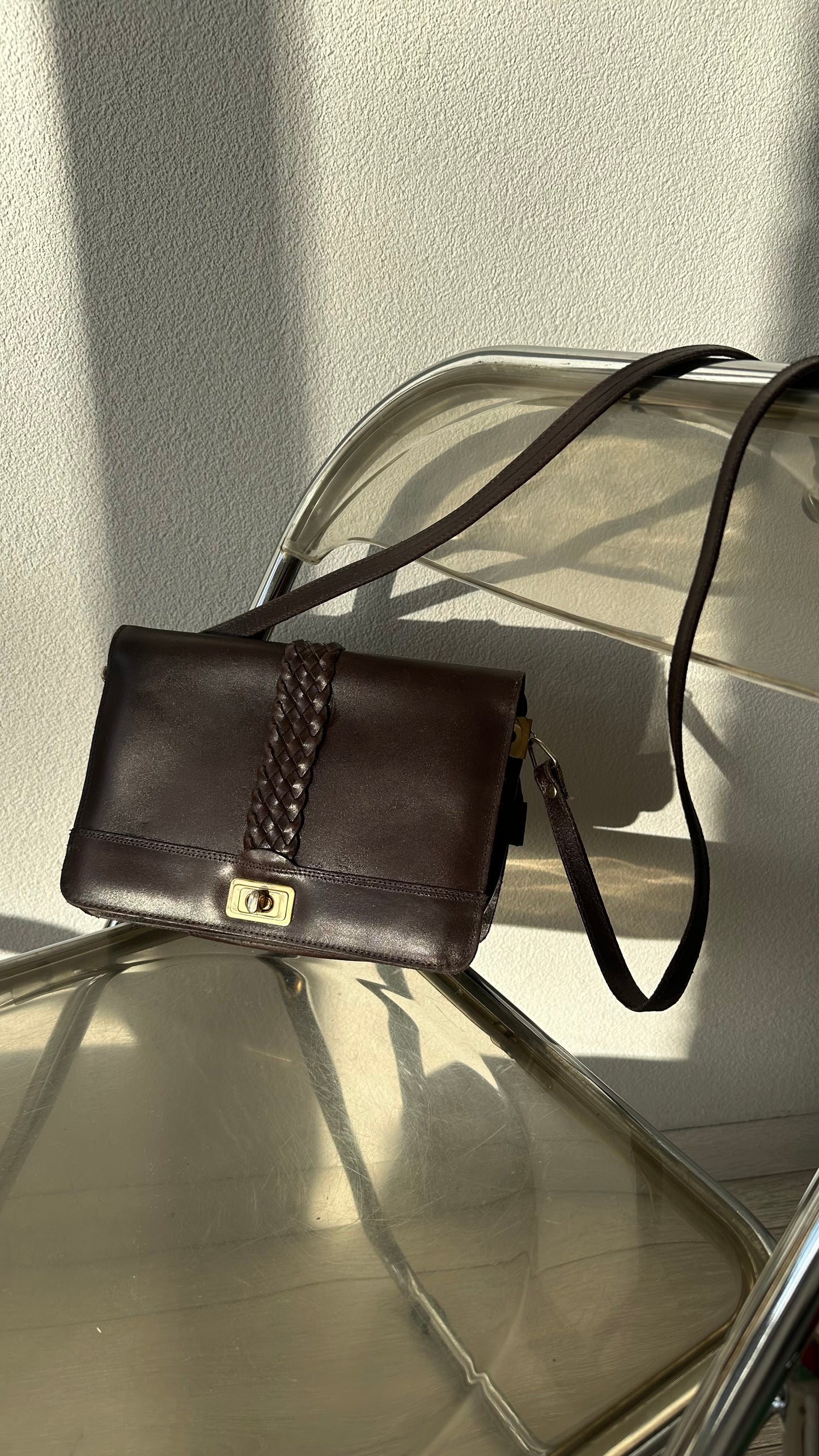 vintage brown leather messenger bag with organiser details and gold twist lock