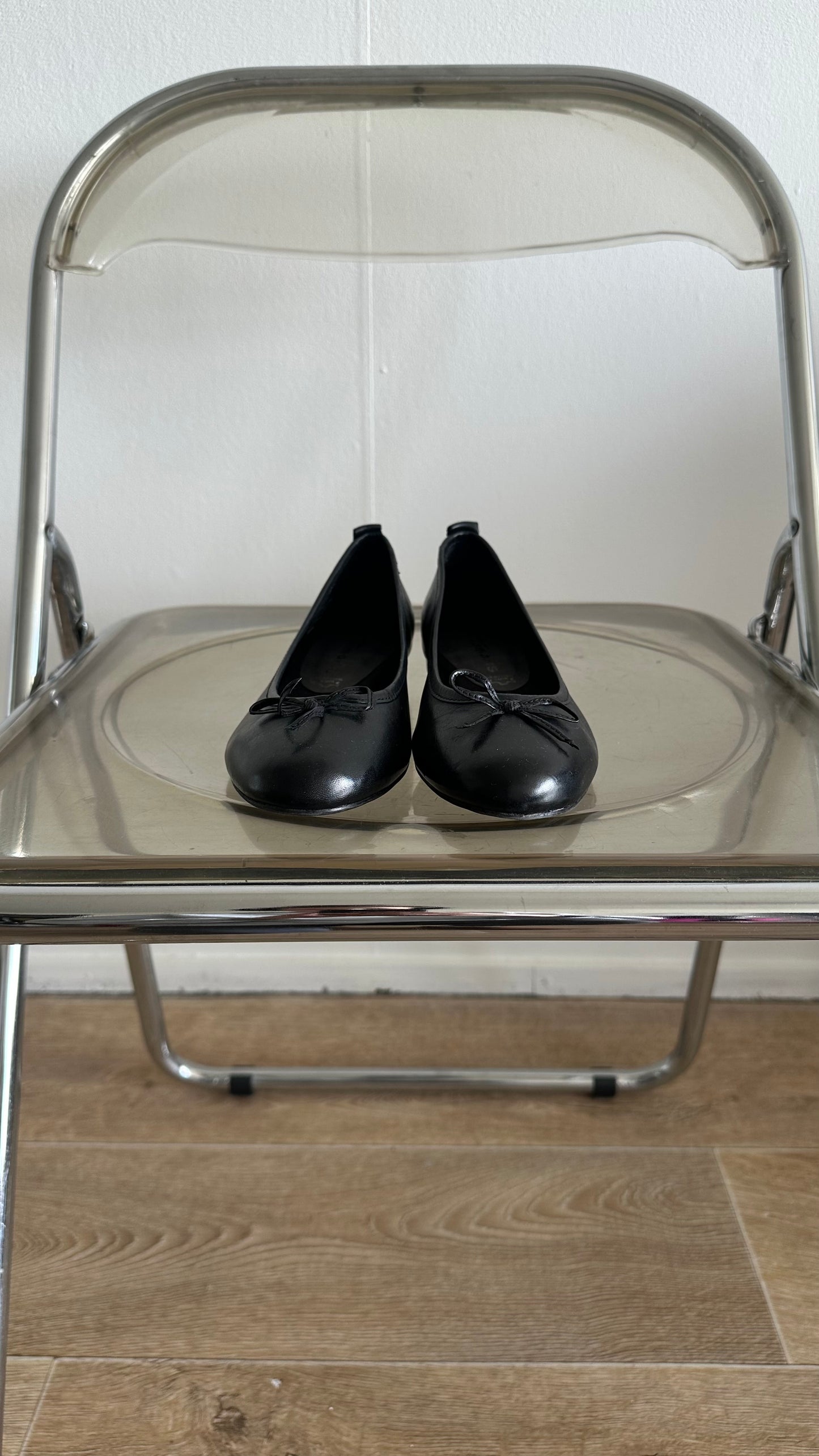black ballet flats in leather
