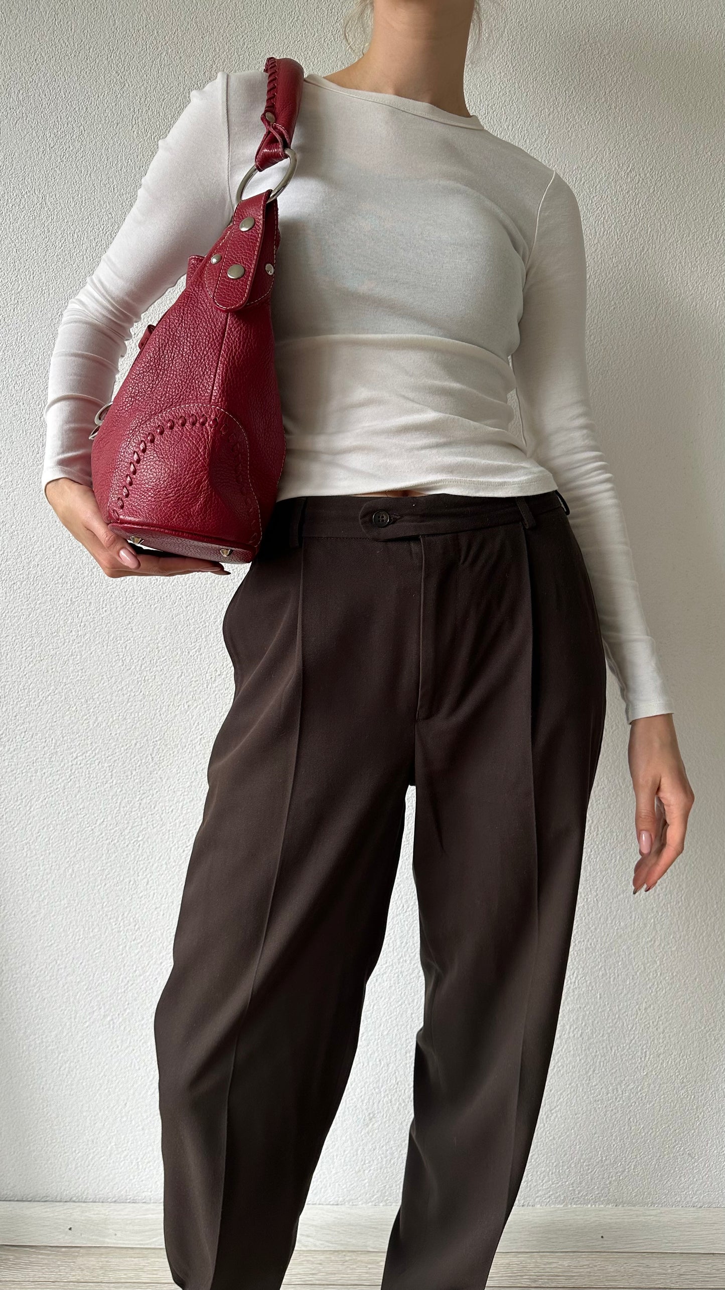 tods red leather bucket bag with silver hardware