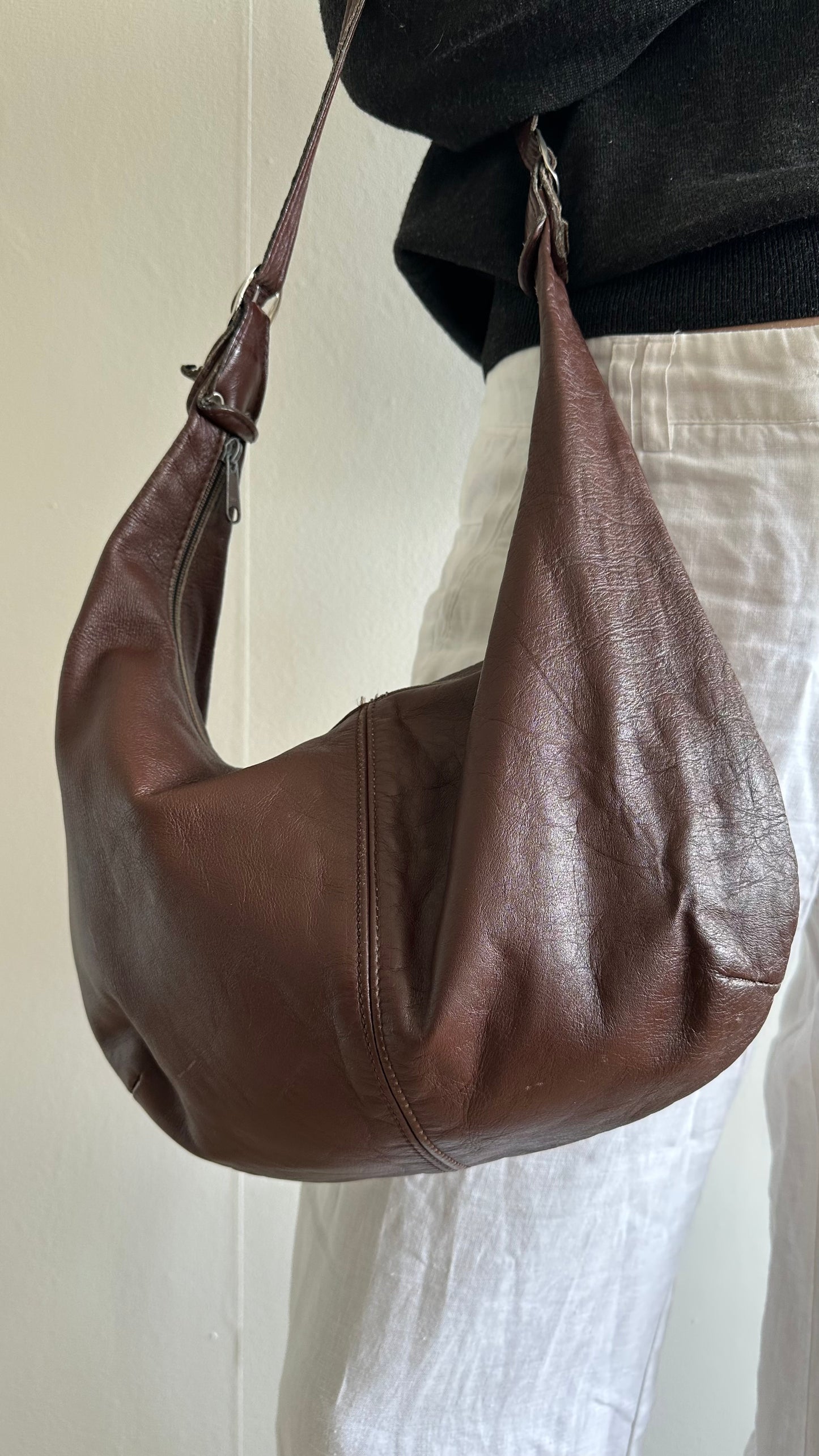 dark brown leather round vintage shoulder bag