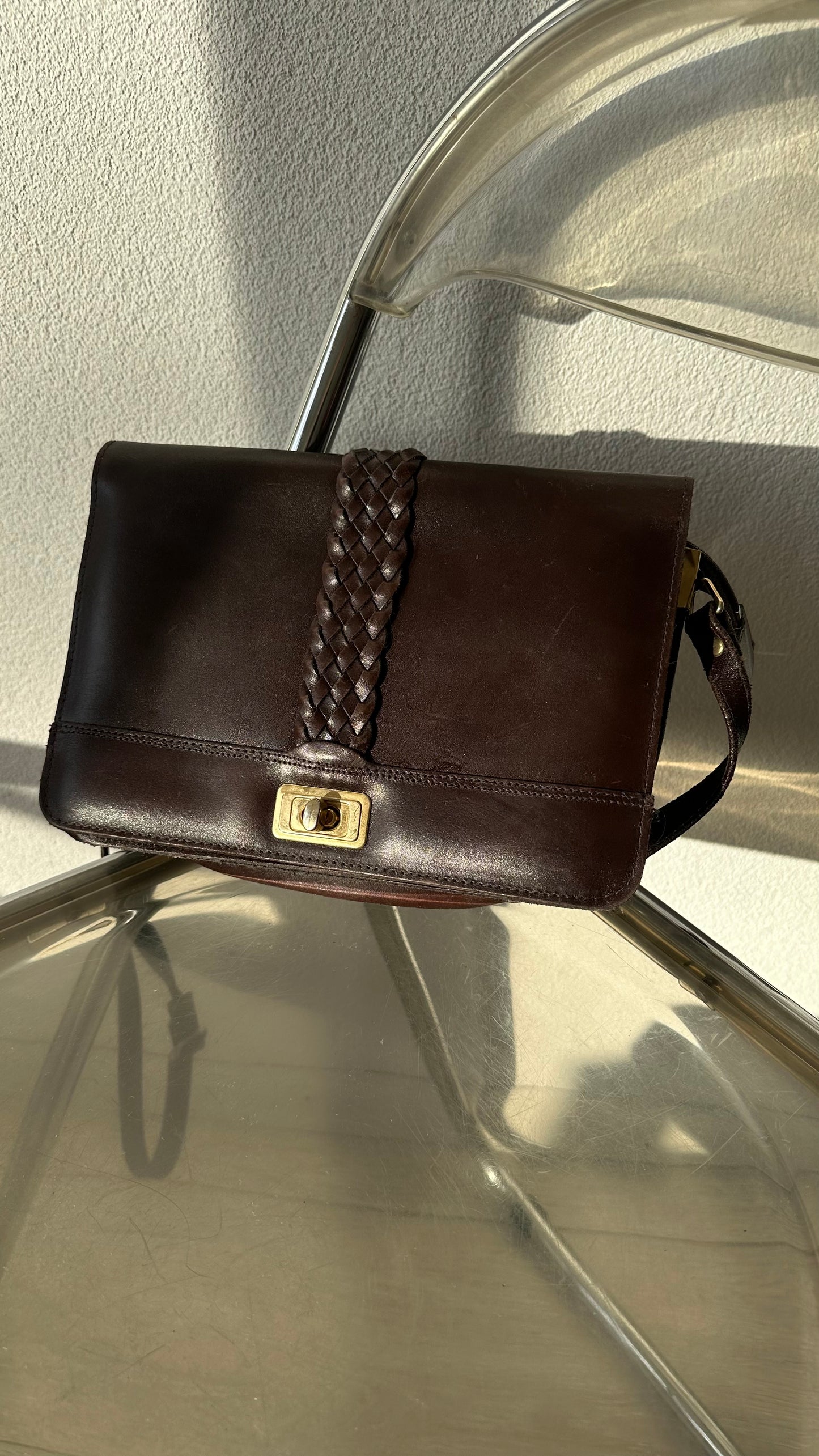 vintage brown leather messenger bag with organiser details and gold twist lock