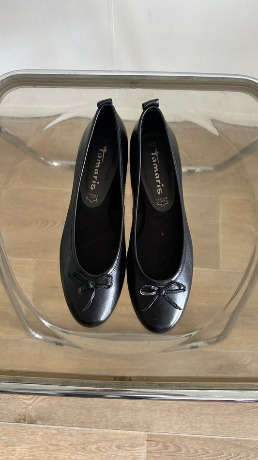 black ballet flats in leather