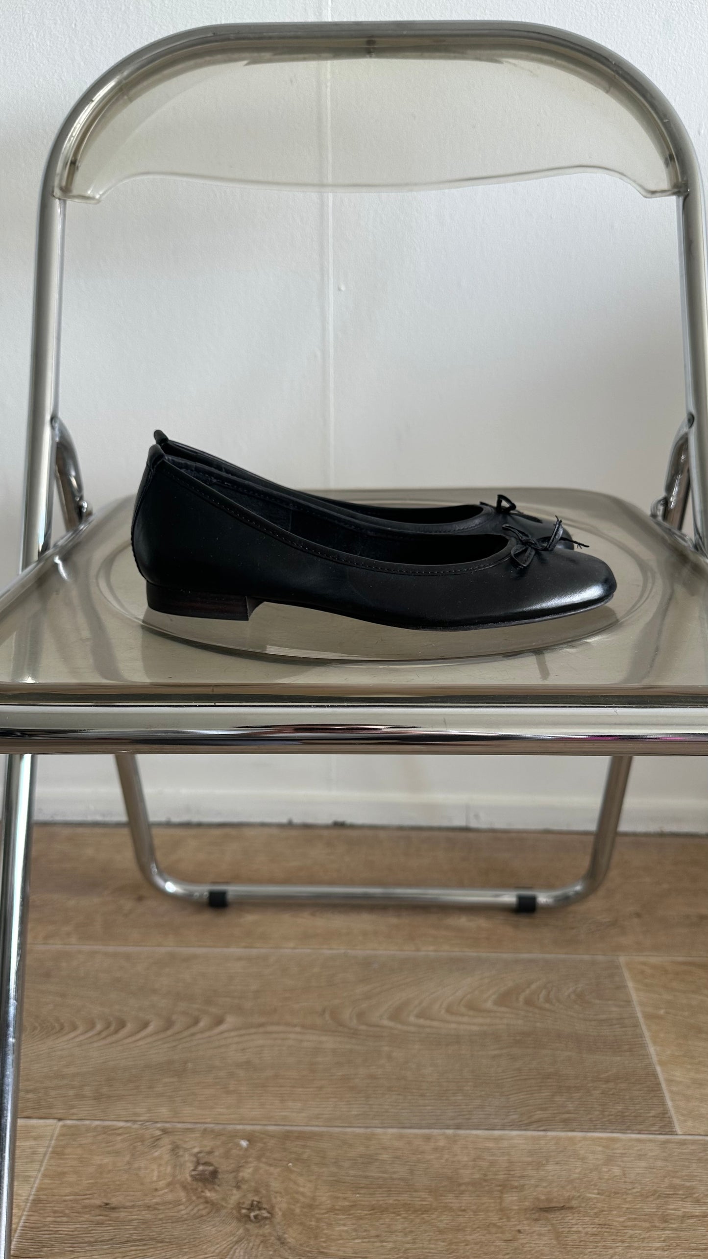 black ballet flats in leather