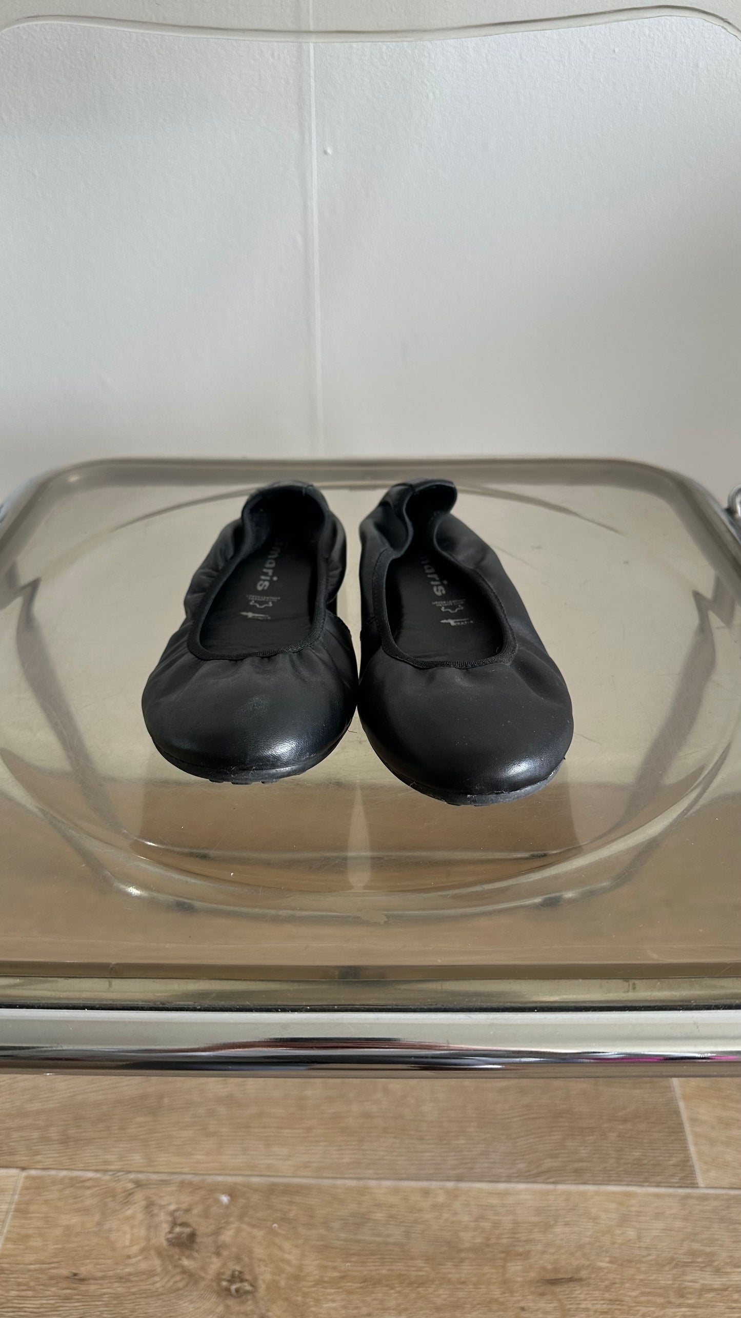 black leather ballet flats