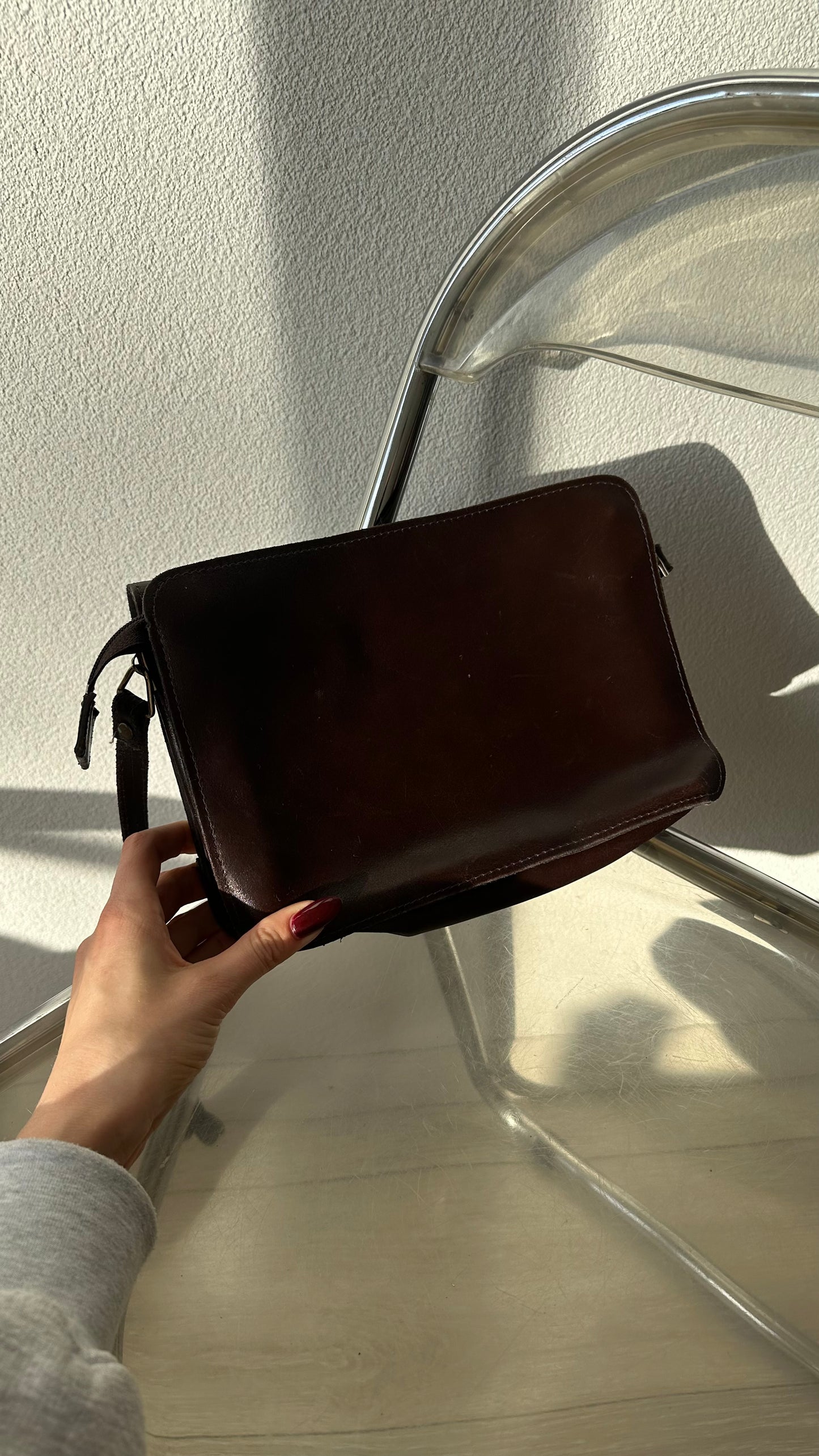 vintage brown leather messenger bag with organiser details and gold twist lock