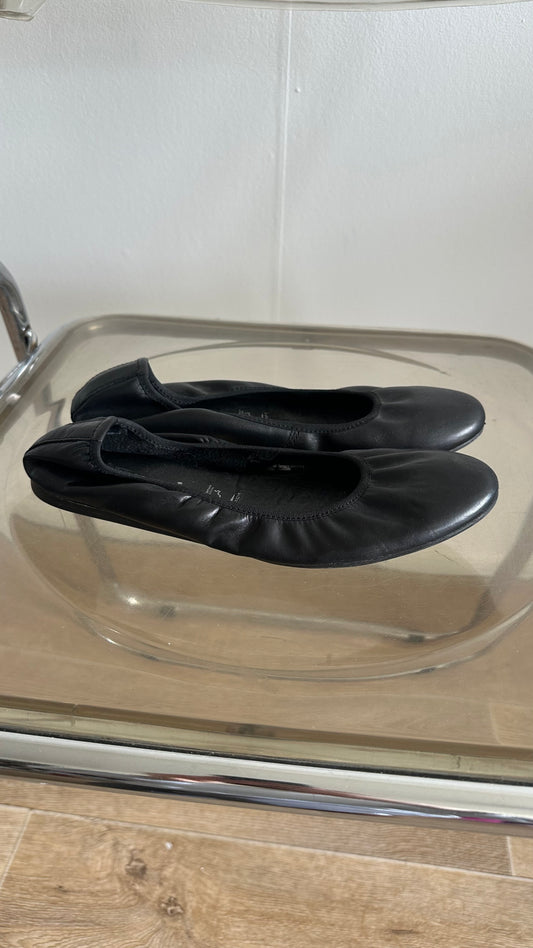 black leather ballet flats