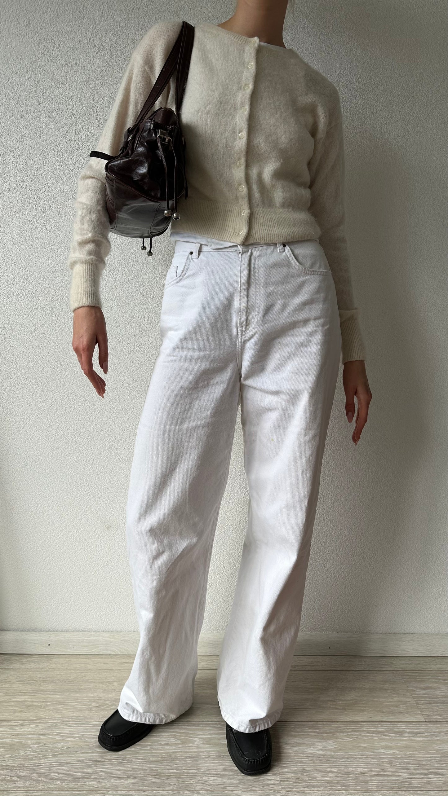 brown leather shoulder bag with silver hardware