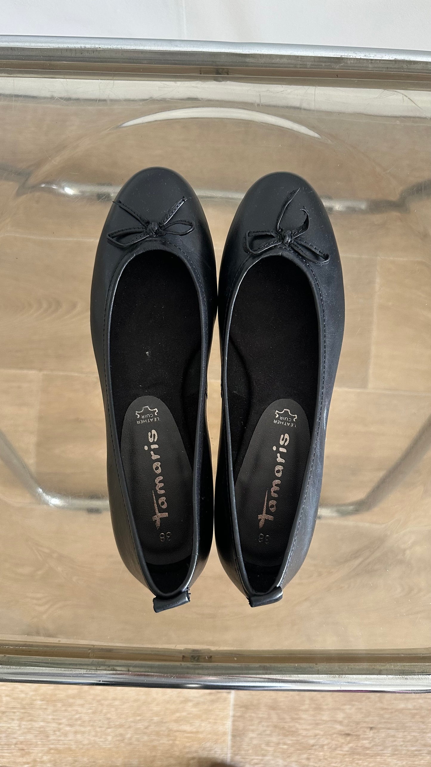 black ballet flats in leather