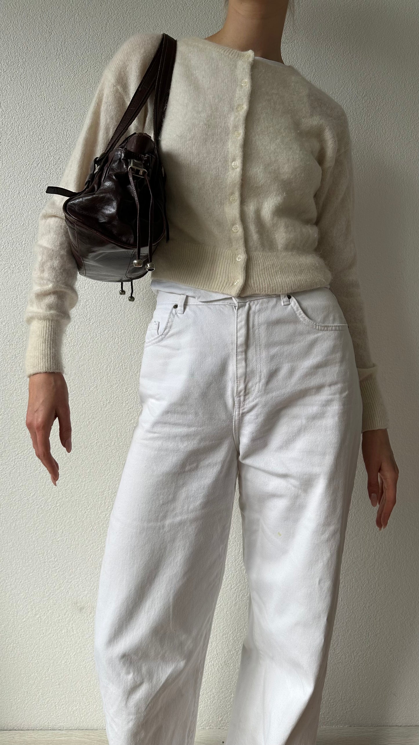 brown leather shoulder bag with silver hardware