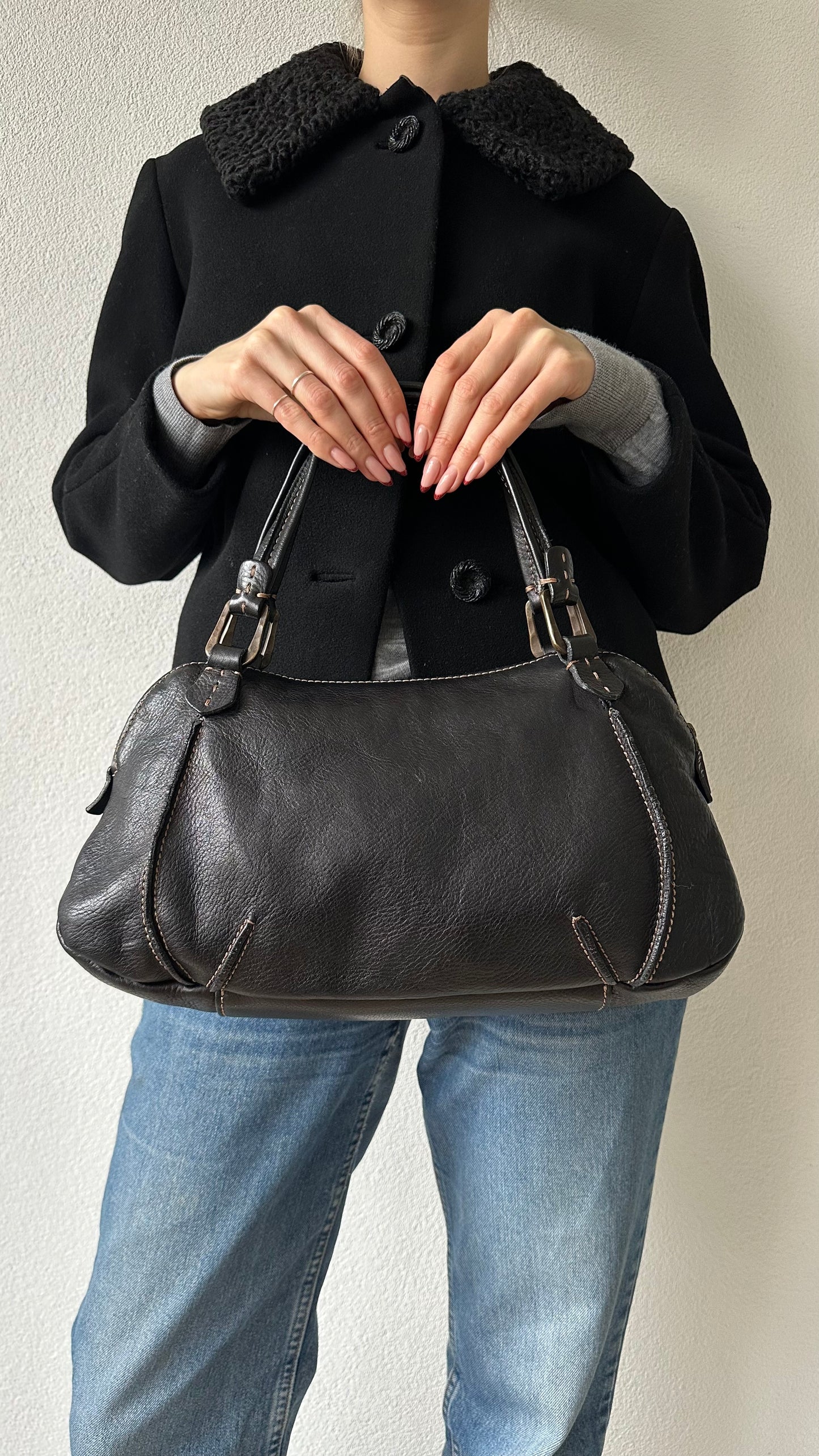 leather francesco biasia handbag with golden hardware