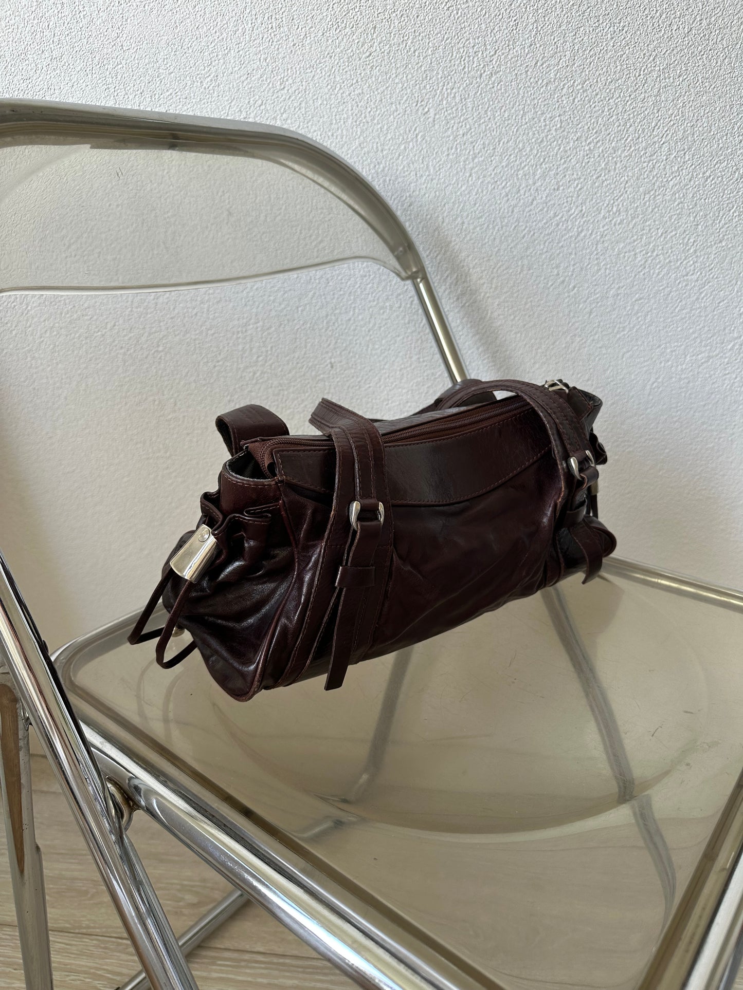brown leather shoulder bag with silver hardware