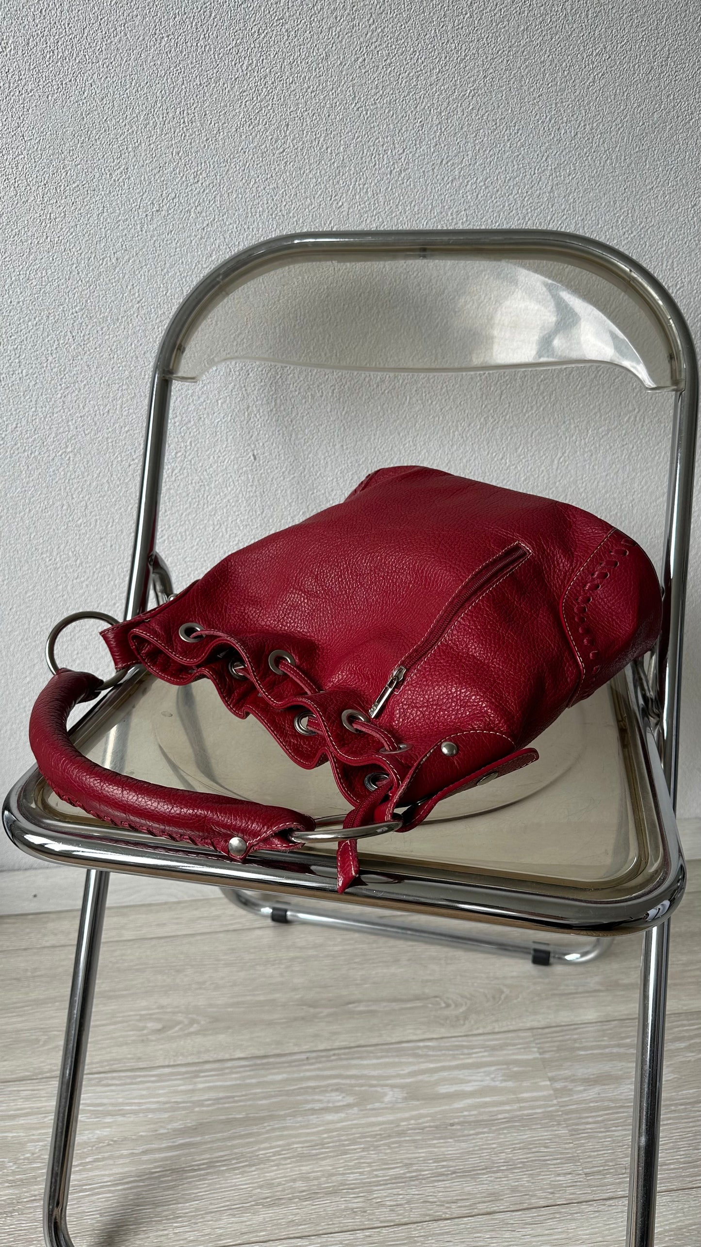 tods red leather bucket bag with silver hardware
