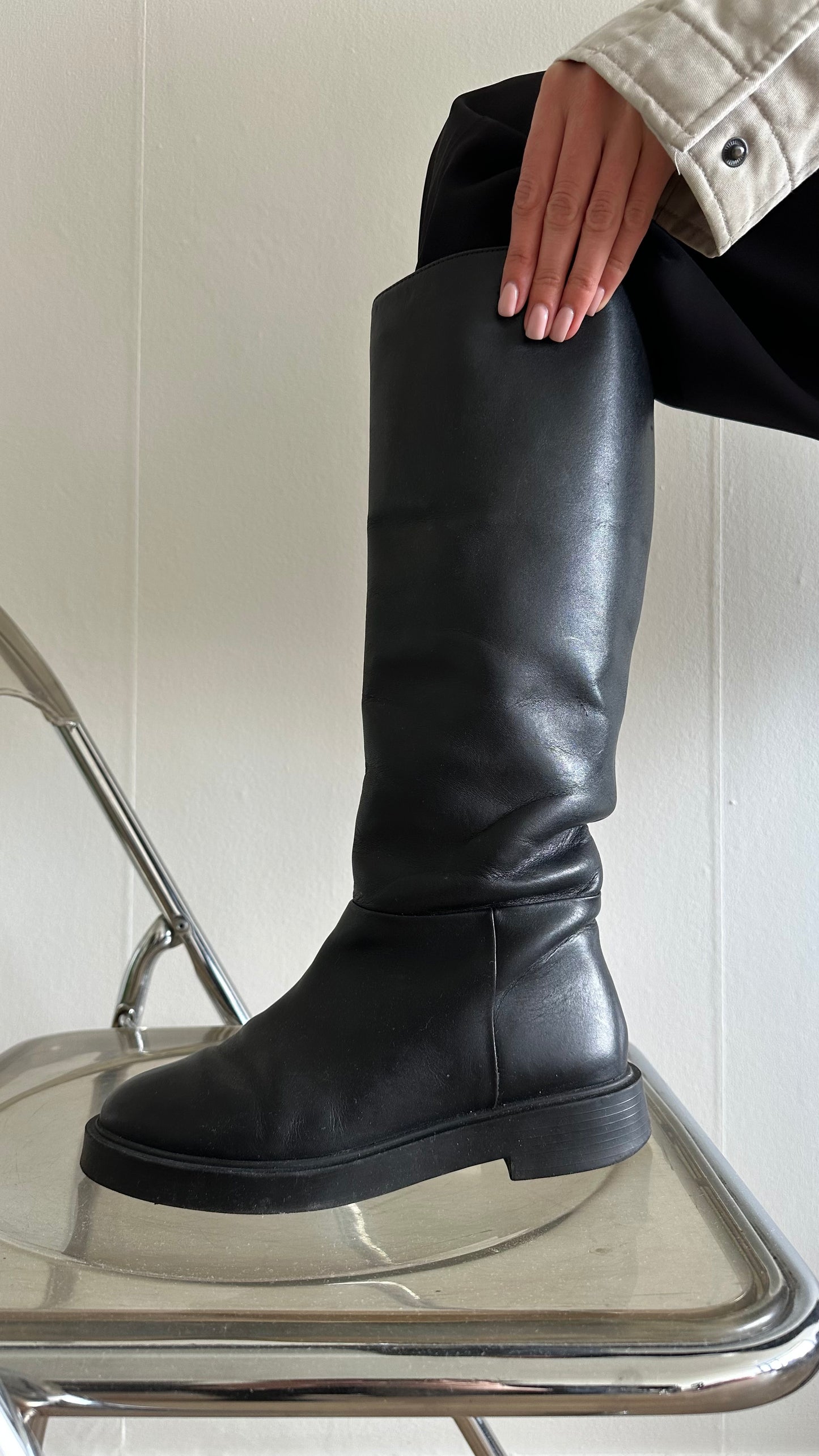 black leather riding boots