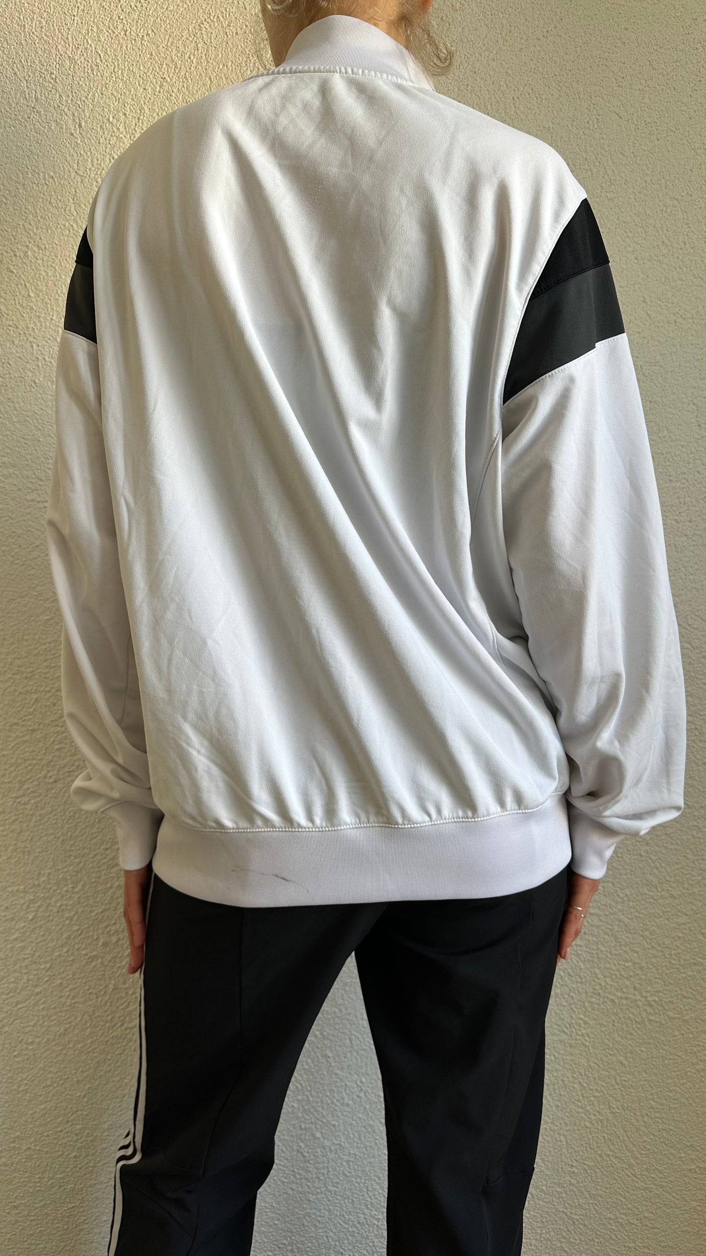 black, white and grey vest nike