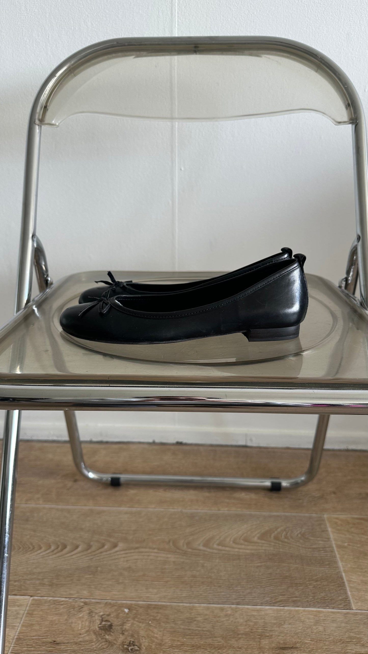 black ballet flats in leather