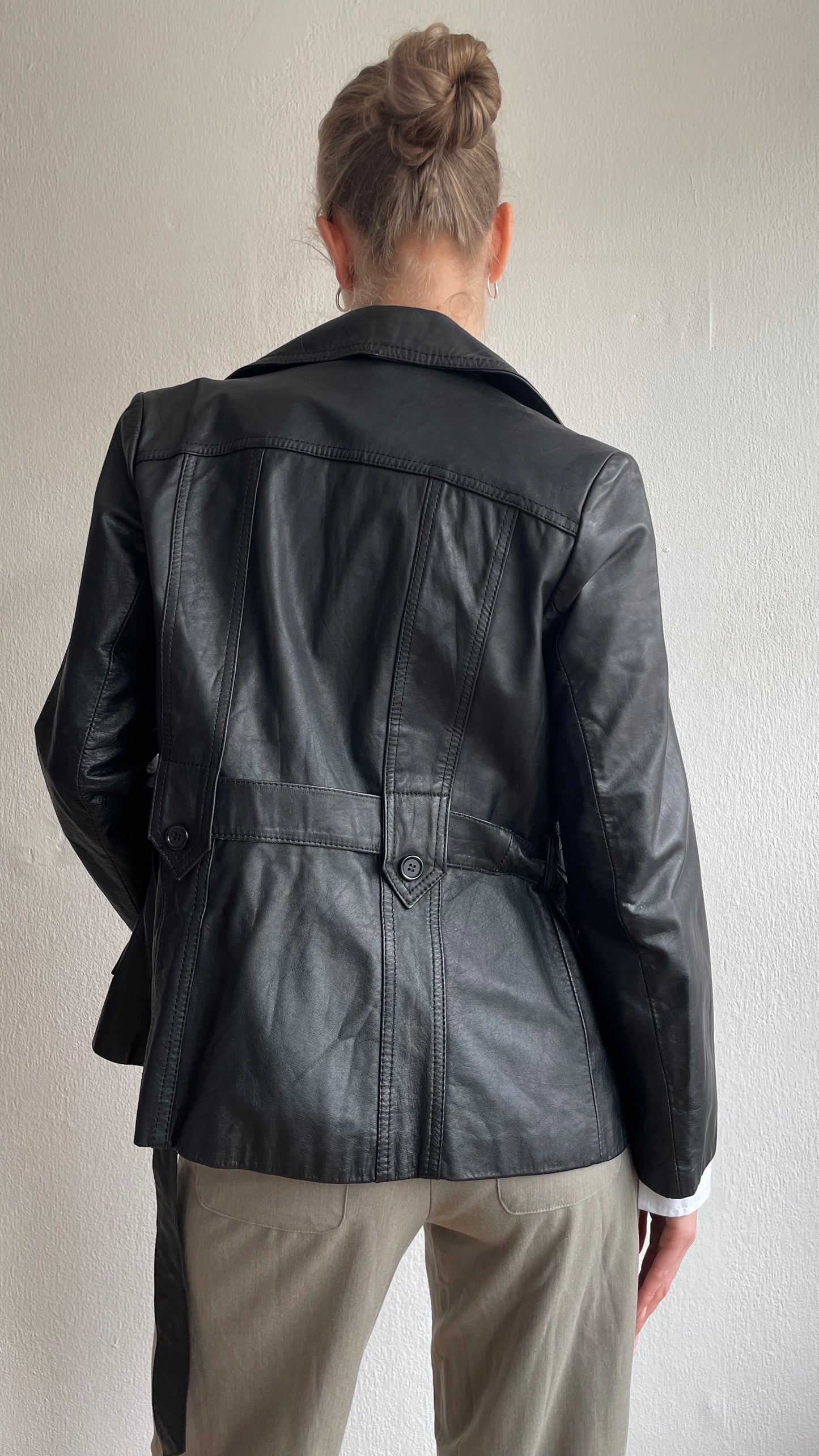 black leather jacket with belt