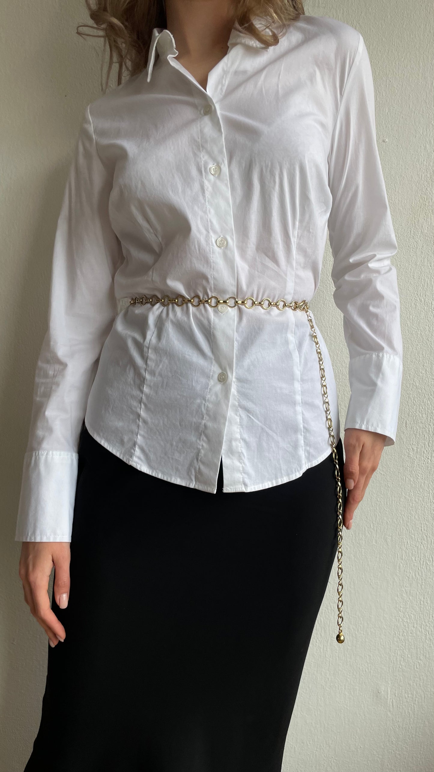 white staple piece fitted blouse