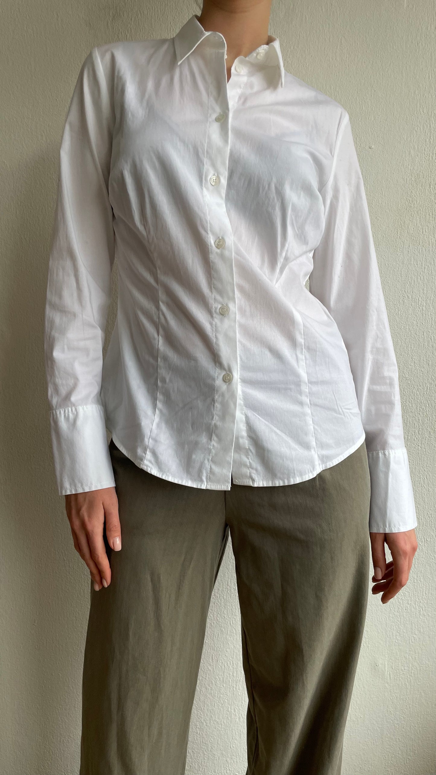 white staple piece fitted blouse