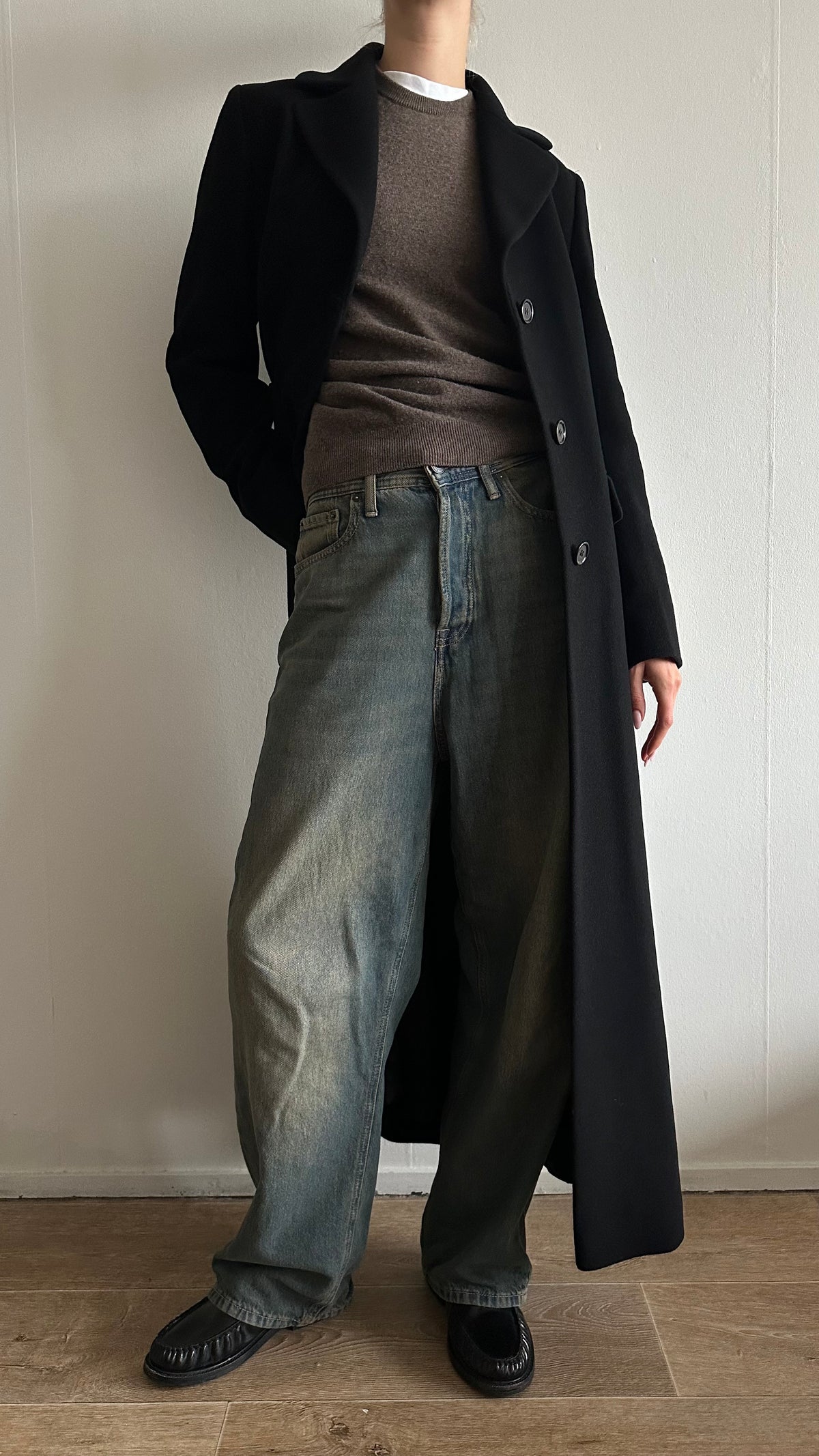 black wool long matrix coat