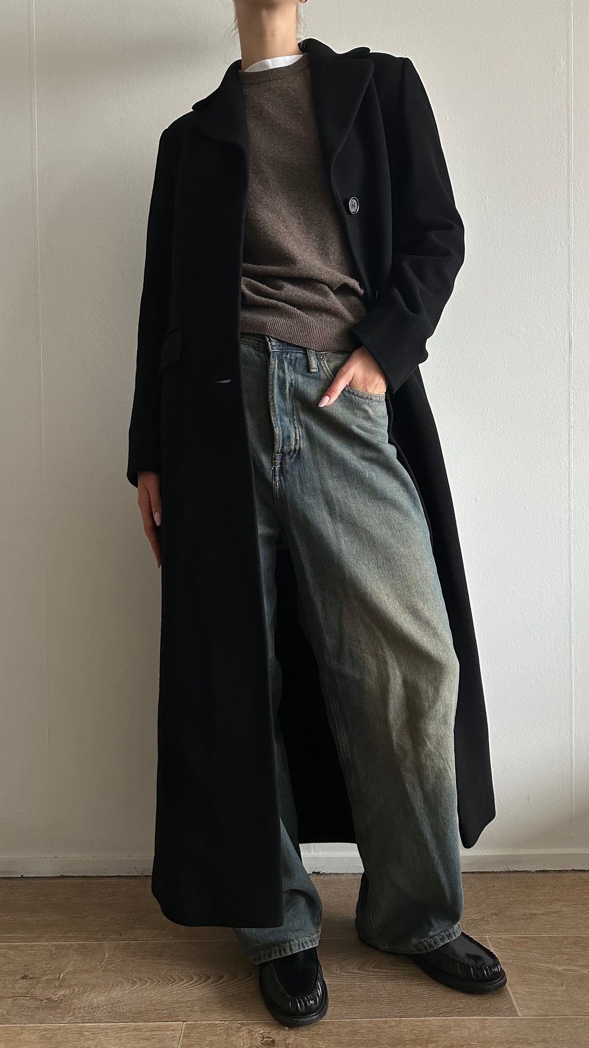 black wool long matrix coat